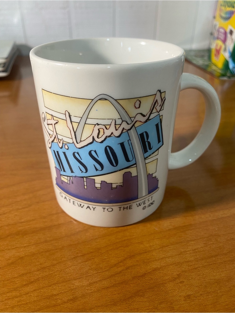 St. Louis Missouri Souvenir Ceramic Mug - White with Blue & Purple Design